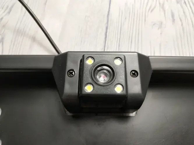 Камера заднього виду в рамці номерного знака CCD 780&times;460 (універсальна, 16 діодів) РНМ-2-12 фото